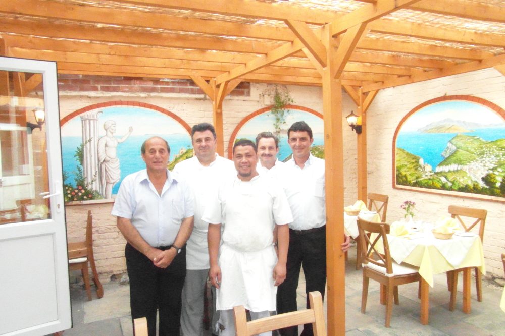 Limoncello's courtyard murals
